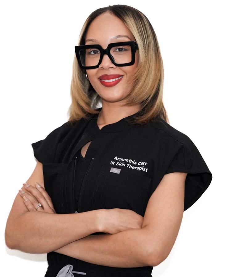 Armenthia Carr, licensed esthetician, in her treatment coat