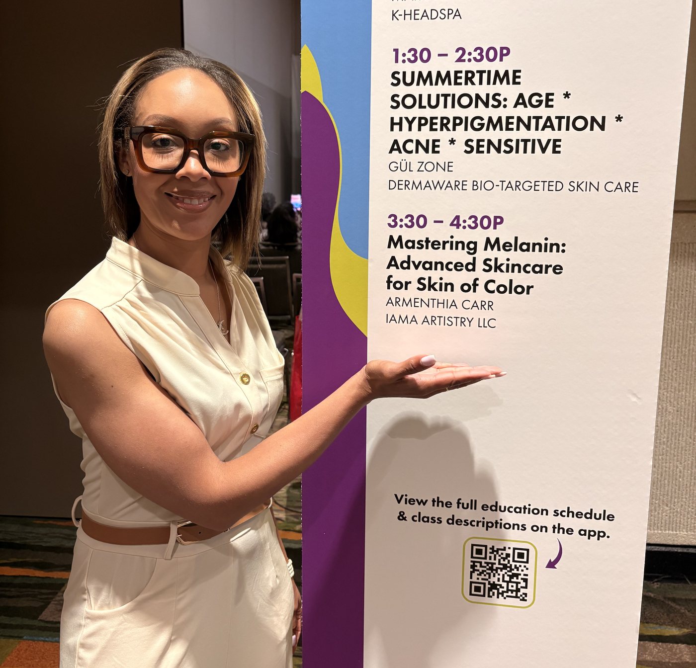 Armenthia Carr beside a convention class schedule listing her session, Mastering Melanin: Advanced Skincare for Skin of Color.